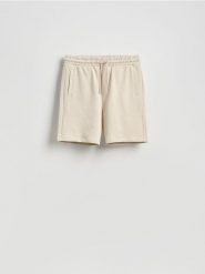 Dresowe szorty regular fit - beżowy. Brązowe krótkie spodenki sportowe Reserved, l, bez wzorów, z bawełny. Za 69.99 zł.