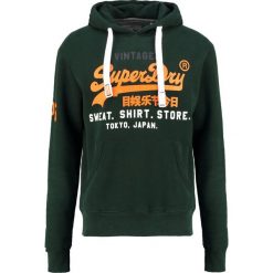 Superdry Bluza z kapturem enamel green. Bluzy z kapturem marki Superdry, m, z bawełny, z kapturem. Za 349.00 zł.