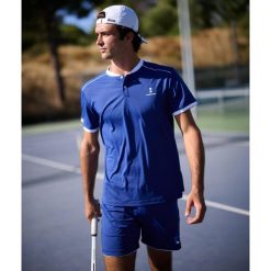 Koszulka polo męska Pro Flex. Niebieskie koszulki polo NORDICDOTS, l, bez wzorów, bez kołnierzyka, bez ramiączek. W wyprzedaży za 252.00 zł.