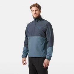 Kurtka przeciwwiatrowa 1/2 zip Helly Hansen Cascade Shield. Niebieskie kurtki Helly Hansen, bez wzorów, z softshellu, bez kaptura. Za 680.50 zł.