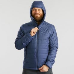 Kurtka trekkingowa męska zimowa Forclaz MT100 kaptur - 5°C. Niebieskie kurtki FORCLAZ, na zimę, l, bez wzorów, z materiału, bez kaptura. Za 179.99 zł.
