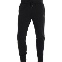 Reebok KNIT JOGGER Spodnie treningowe black. Joggery i bojówki marki Reebok. W wyprzedaży za 237.15 zł.