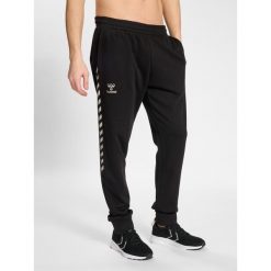 Jogging w bawełnie Hummel HmlStaltic. Czarne szorty Hummel, l, bez wzorów, z bawełny, sportowe. Za 170.00 zł.