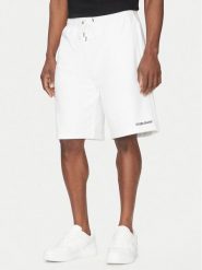 Guess Jeans Szorty sportowe M5GD49 KCPR1 Biały Regular Fit. Białe krótkie spodenki sportowe Guess Jeans, m, z aplikacjami, z bawełny. Za 259.99 zł.
