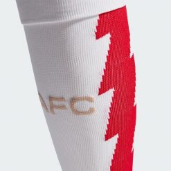 Getry Arsenal 23/24 Home. Białe legginsy długie sportowe Adidas, bez wzorów, z bawełny, do piłki nożnej. Za 54.50 zł.