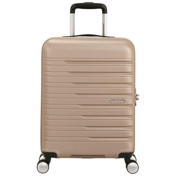 Walizka podróżna American Tourister Flashline Spinner 55 34. Brązowe walizki American Tourister, bez wzorów, z materiału. Za 399.99 zł.
