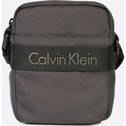 Calvin Klein Jeans - Saszetka Madox Mini. Saszetki i nerki marki Calvin Klein Jeans. W wyprzedaży za 159.90 zł.