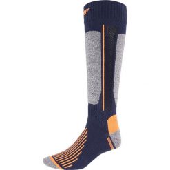 Skarpety narciarskie męskie SOMN254z - neon pomarańcz melanż. Skarpety marki ARTENGO. Za 44.99 zł.