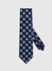 PAKO LORENTE – Granatowy krawat męski we wzór geometryczny. Niebieskie krawaty i muchy Pako Lorente, bez wzorów, z poliesteru. Za 69.99 zł.
