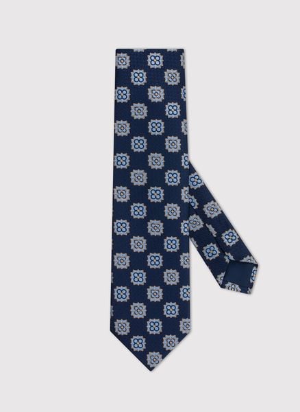 PAKO LORENTE – Granatowy krawat męski we wzór geometryczny. Niebieskie krawaty i muchy Pako Lorente, bez wzorów, z poliesteru. Za 69.99 zł.