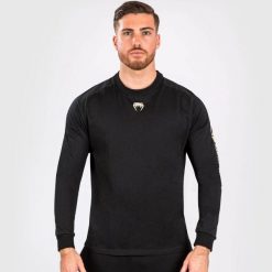Longsleeve męski Venum UFC By Adrenaline Fight Week Dry-Tech. Czarne bluzki z długim rękawem VENUM, m, bez wzorów, bez kołnierzyka, bez ramiączek. Za 184.00 zł.