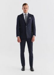 PAKO LORENTE – Wełniane spodnie garniturowe w kratę. Niebieskie eleganckie spodnie Pako Lorente, bez wzorów, z wełny. Za 999.99 zł.