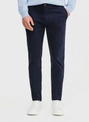 PAKO LORENTE – Granatowe gładkie spodnie męskie. Spodnie materiałowe Pako Lorente, na co dzień, l, bez wzorów, z bawełny, casualowe. Za 119.99 zł.