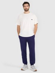 4F Spodnie dresowe joggery męskie - granatowe M. Niebieskie spodnie materiałowe 4F, na co dzień, l, bez wzorów, z bawełny, sportowe. W wyprzedaży za 79.99 zł.