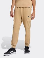 Adidas Bojówki w kolorze beżowym rozmiar: L. Brązowe joggery i bojówki Adidas, l, bez wzorów. Za 176.95 zł.