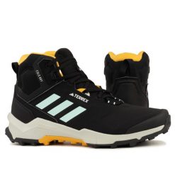 Buty męskie trekingowe wodoodporne Adidas TERREX AX4 MID BETA. Czarne buty sportowe casual Adidas, na zimę, bez wzorów, bez zapięcia. W wyprzedaży za 499.00 zł.