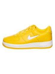 Nike Skórzane sneakersy "Air Force 1 Low Retro" w kolorze żółtym rozmiar: 40. Żółte buty sportowe casual Nike, bez wzorów, bez zapięcia. Za 430.46 zł.