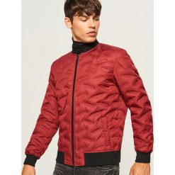 Kurtka z naturalnym puchem - Czerwony. Kurtki marki Under Armour. W wyprzedaży za 149.99 zł.