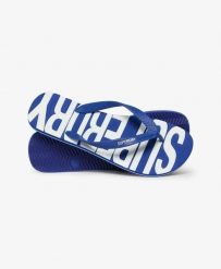 Superdry Klapki Core Logo z gumy, lekkie i wygodne – Regal Blue/Optic. Niebieskie klapki Superdry, z gumy. Za 134.40 zł.