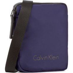 Saszetka CALVIN KLEIN - Blithe Mini Reporter K50K503448 426. Saszetki i nerki marki CALVIN KLEIN. W wyprzedaży za 219.00 zł.