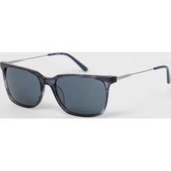 Calvin Klein - Okulary przeciwsłoneczne CK19703S.421. Niebieskie okulary przeciwsłoneczne CALVIN KLEIN, prostokątne. W wyprzedaży za 159.90 zł.