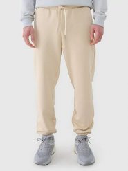 4F Spodnie dresowe w kolorze beżowym rozmiar: XXL. Brązowe spodnie treningowe długie 4F, xxl, bez wzorów, z dresówki. Za 64.99 zł.