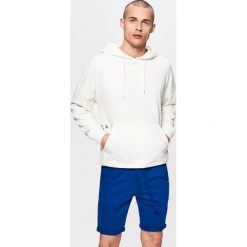 Dresowe szorty - Niebieski. Krótkie spodenki sportowe Cropp. Za 59.99 zł.