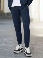 Spodnie dresowe slim jogger - niebieski. Niebieskie joggery i bojówki Sinsay, l, bez wzorów, z dresówki. Za 39.99 zł.