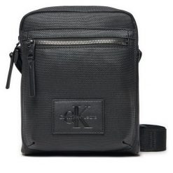 Saszetka Calvin Klein Jeans. Czarne saszetki i nerki Calvin Klein Jeans, bez wzorów, z jeansu. Za 219.99 zł.