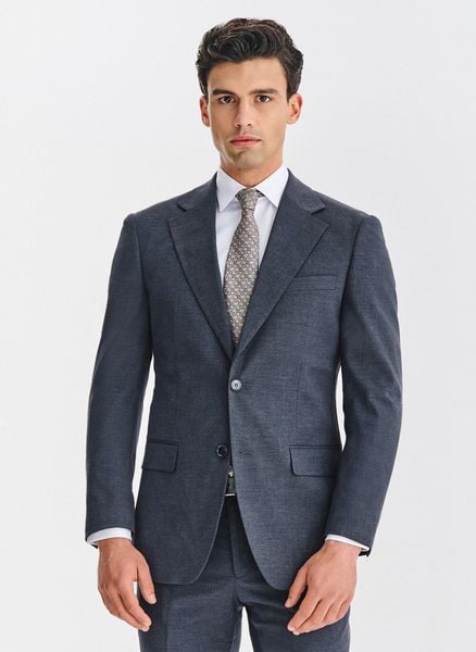 PAKO LORENTE - Granatowa marynarka garniturowa. Garnitury Pako Lorente, do pracy, m, bez wzorów, z elastanu. Za 599.99 zł.