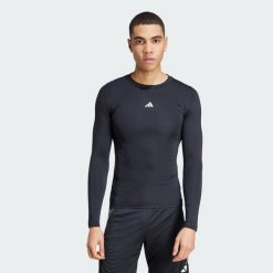 Koszulka z długim rękawem TECHFIT. Czarne bielizna termoaktywna Adidas, bez wzorów, z elastanu, bez ramiączek, do piłki nożnej. Za 115.99 zł.