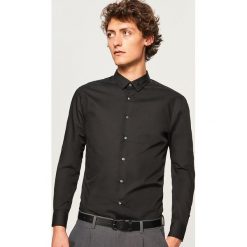 Koszula regular fit - Czarny. Koszule marki Under Armour. Za 79.99 zł.