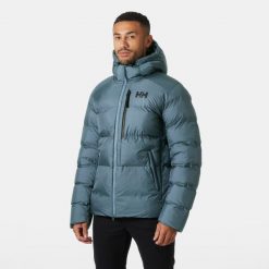Kurtka z kapturem Helly Hansen Active Winter. Niebieskie kurtki Helly Hansen, bez wzorów, z puchu, z kapturem. W wyprzedaży za 1,157.50 zł.