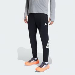 Spodnie adi365 Iconic Running. Czarne buty do biegania Adidas, bez wzorów, bez zapięcia, do biegania, climacool (adidas). Za 279.00 zł.