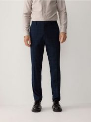 Spodnie garniturowe slim fit - granatowy. Niebieskie garnitury Reserved, bez wzorów, z tkaniny. Za 169.99 zł.