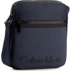 Saszetka CALVIN KLEIN - Alec Reporter K50K503186 422. Saszetki i nerki marki CALVIN KLEIN. W wyprzedaży za 259.00 zł.