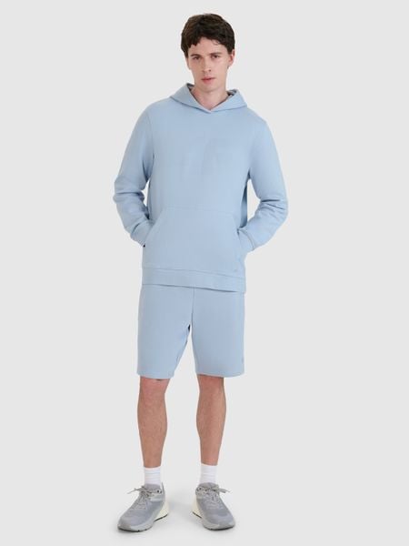 4F Spodenki dresowe męskie - niebieskie M. Niebieskie krótkie spodenki sportowe 4F, l, bez wzorów, z bawełny, sportowe. W wyprzedaży za 59.99 zł.