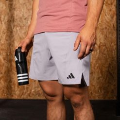 Spodenki fitness męskie ADIDAS. Szorty Adidas, l, bez wzorów, z elastanu, sportowe. Za 189.99 zł.
