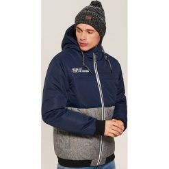 Dwukolorowa kurtka z kapturem - Granatowy. Kurtki marki B'TWIN. W wyprzedaży za 169.99 zł.