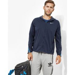 Nike Kurtka Impossibly Light Jkt Hooded , granatowy, rozmiar L. Niebieskie kurtki Nike, l, bez wzorów, z nylonu. W wyprzedaży za 199.99 zł.