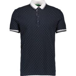 Koszulka polo w kolorze granatowym. Koszulki polo sportowe marki Benetton. W wyprzedaży za 55.95 zł.