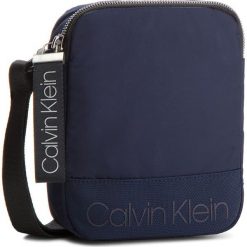 Saszetka CALVIN KLEIN - Shadow Mini Reporter K50K503904 443. Saszetki i nerki marki CALVIN KLEIN. W wyprzedaży za 229.00 zł.