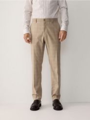 Spodnie garniturowe slim fit - beżowy. Brązowe garnitury Reserved, bez wzorów, z tkaniny. Za 169.99 zł.