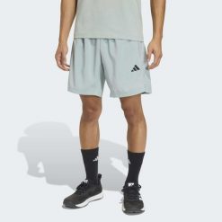 Spodenki fitness męskie ADIDAS. Zielone szorty Adidas, m, bez wzorów, ze skóry, sportowe. Za 129.99 zł.