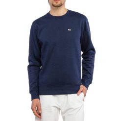 Bluza męska sportowa Tommy Hilfiger TJM REGULAR FLEECE. Niebieskie bluzy bez kaptura Tommy Hilfiger, m, bez wzorów, bez kaptura. W wyprzedaży za 249.00 zł.