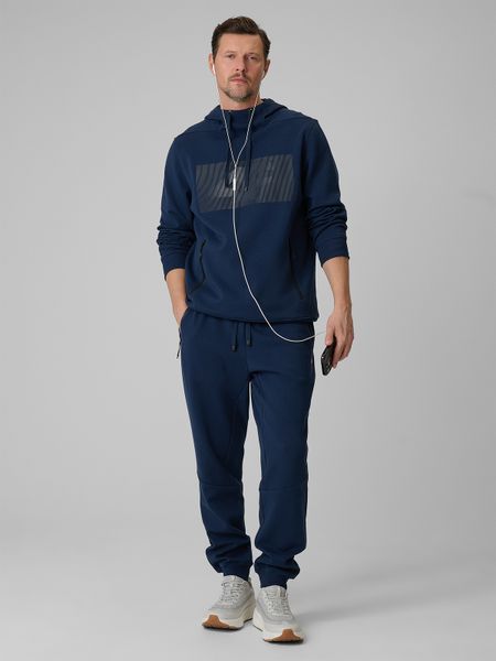 4F Spodnie dresowe joggery męskie - granatowe XXL. Niebieskie joggery i bojówki 4F, m, bez wzorów, z bawełny. Za 179.99 zł.