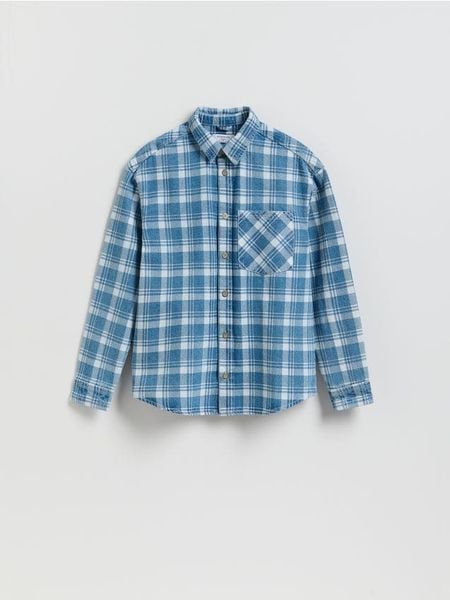 Jeansowa koszula regular fit - niebieski. Niebieskie koszule Reserved, l, bez wzorów, z bawełny, bez kołnierzyka, bez ramiączek. Za 149.99 zł.