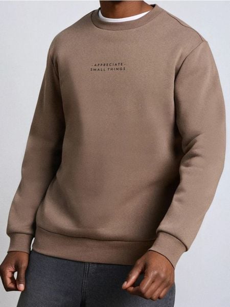 Bluza crewneck z napisem - brązowy. Brązowe bluzy bez kaptura Sinsay, l, bez wzorów, bez kaptura. W wyprzedaży za 13.99 zł.