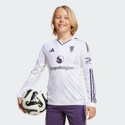 Wyjazdowa koszulka z długim rękawem Manchester United 25/26. Białe bluzki z długim rękawem Adidas, bez wzorów, bez kołnierzyka, bez ramiączek. Za 369.00 zł.