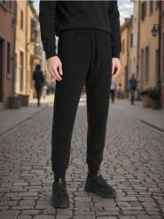 Spodnie dresowe jogger - czarny. Czarne joggery i bojówki Sinsay, l, bez wzorów, z bawełny, sportowe. Za 49.99 zł.